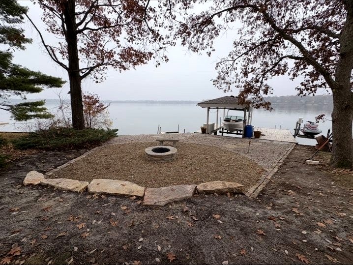 Lakeside fire pit and gravel patio