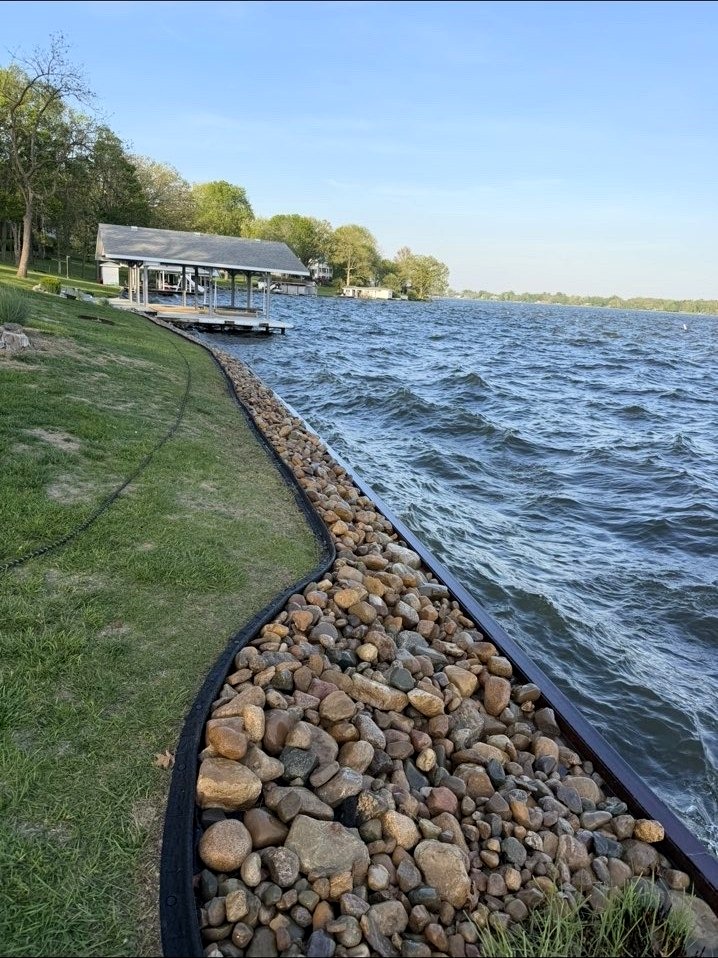 Natural stone shoreline installation