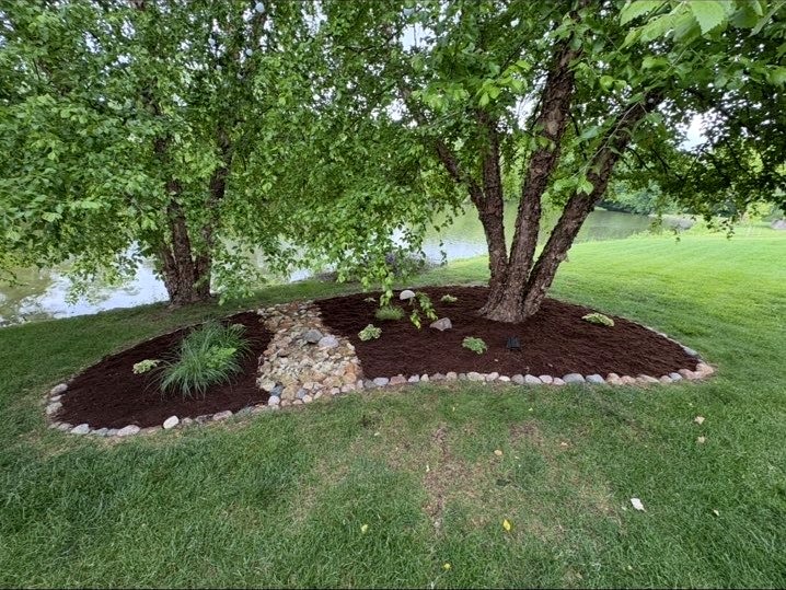 Completed lakeside tree bed landscaping